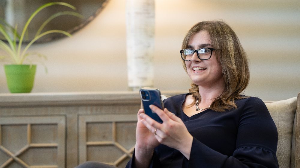 Girl opening her account from her phone